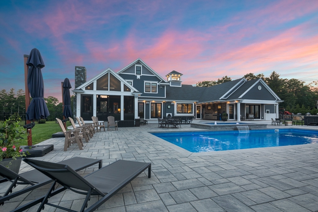 17 Chestnut Lane Littleton, MA 01460 - Photo 38 of 40 a view of a house with swimming pool and sitting area