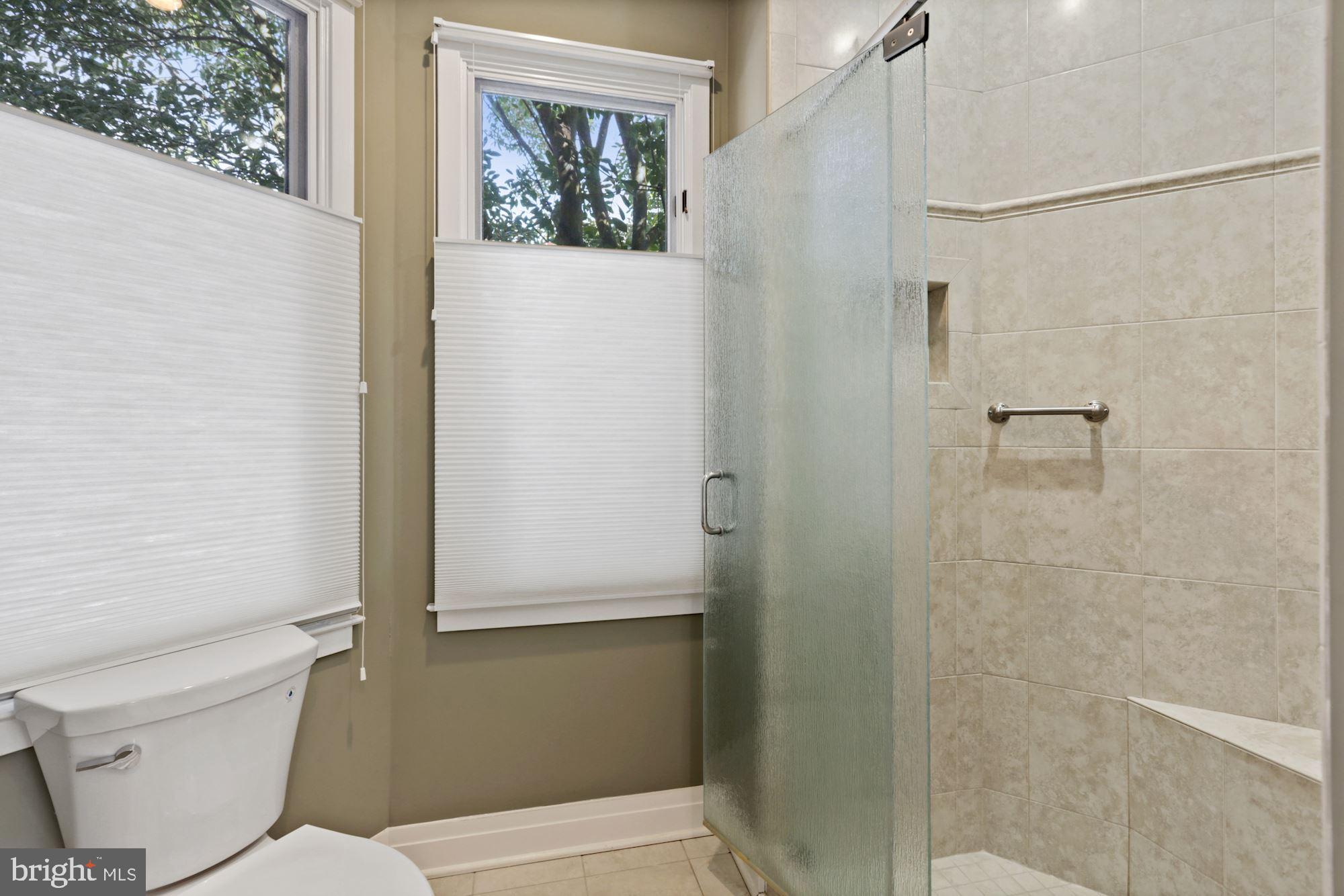 11331 Woodbrook Lane Reston, VA 20194 - Photo 25 of 43 Remodeled separate shower has custom tile