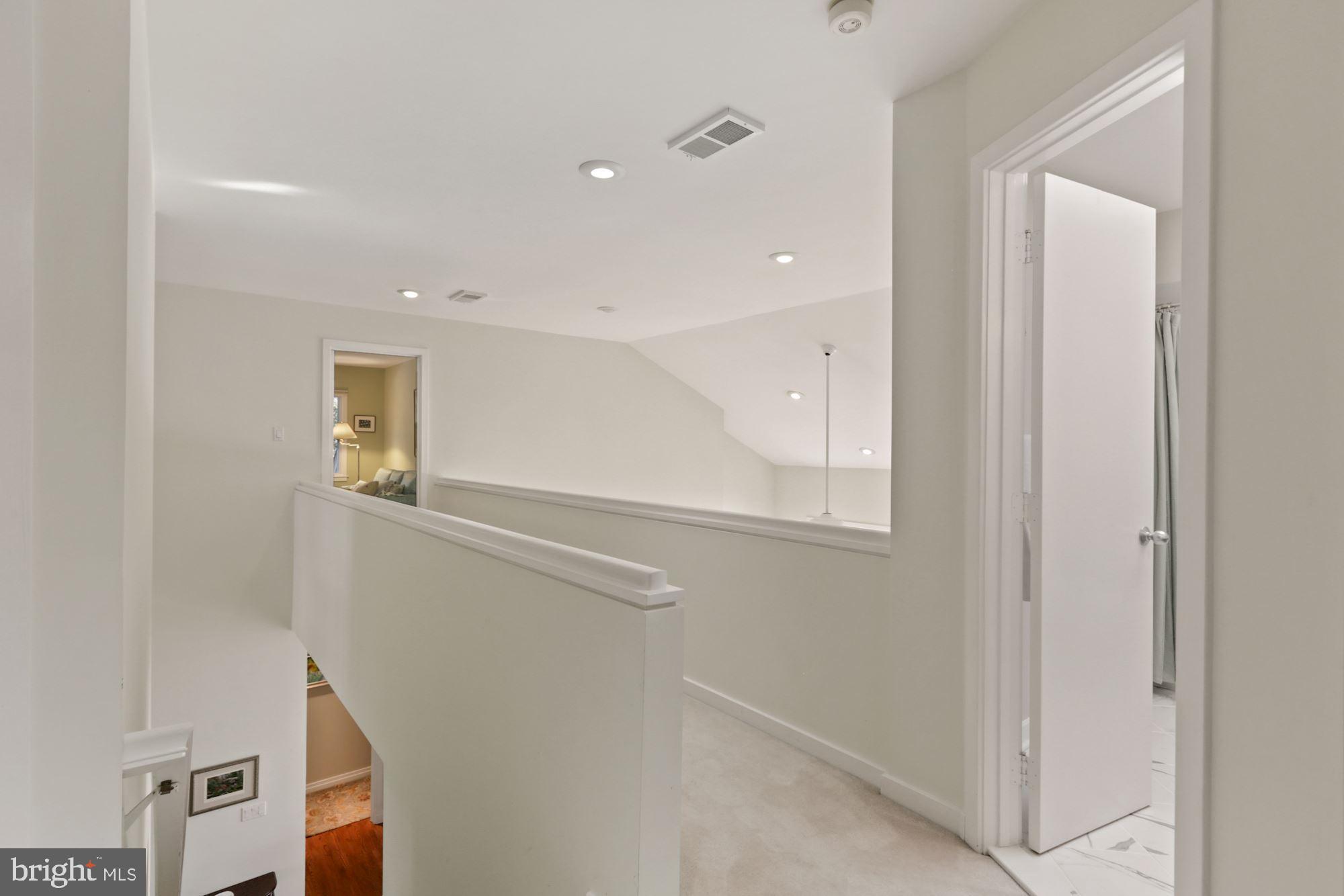 11331 Woodbrook Lane Reston, VA 20194 - Photo 29 of 43 Upper Level Hallway Bridge to Bedroom 2