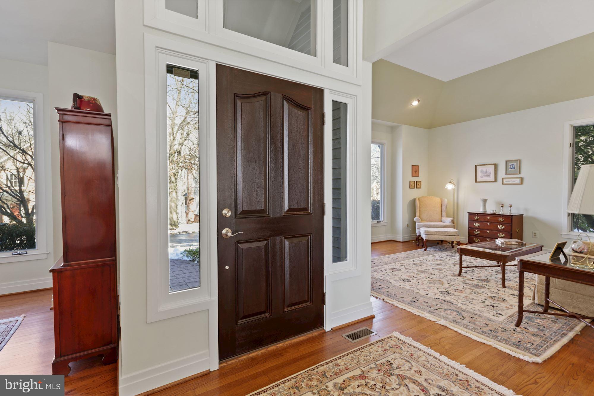 11331 Woodbrook Lane Reston, VA 20194 - Photo 43 of 43 Enter into an open floorplan and 2-story ceiling