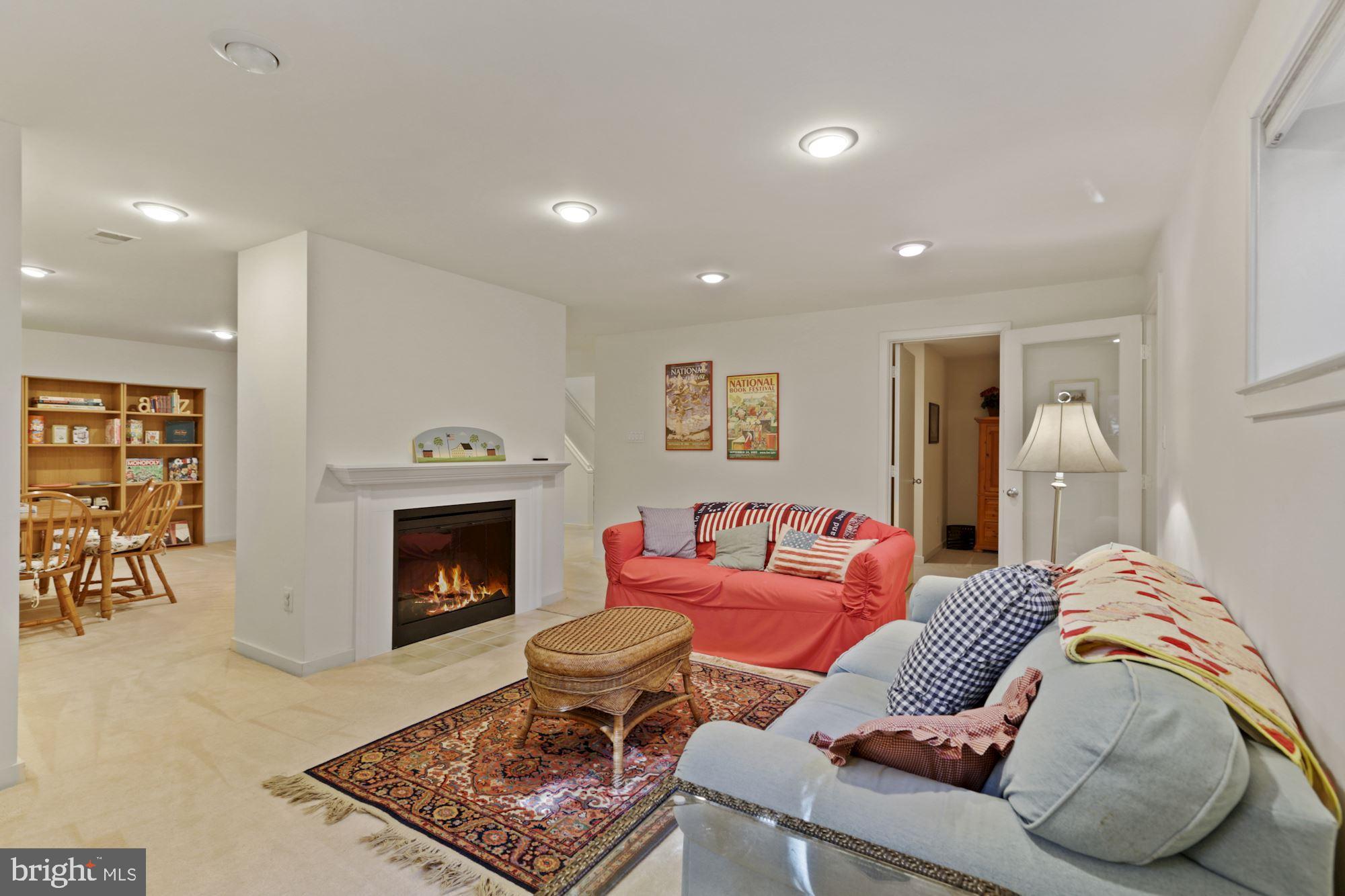 11331 Woodbrook Lane Reston, VA 20194 - Photo 34 of 43 Lower level has cozy Den area with fireplace