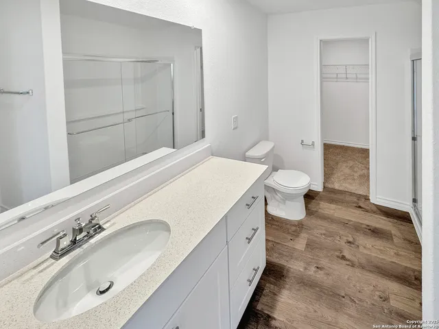 a bathroom with a sink and a toilet