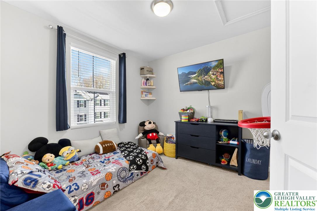 2132 Cross Country Road Northampton, PA 18067 - Photo 14 of 24 a bed room with a bed and a window