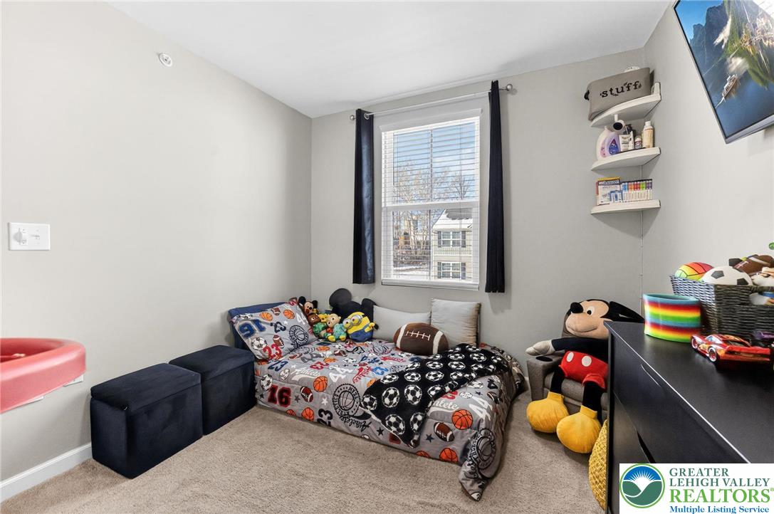 2132 Cross Country Road Northampton, PA 18067 - Photo 15 of 24 a bedroom with furniture toys and a window