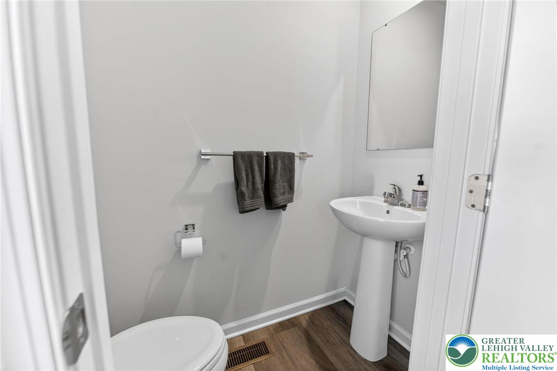 2132 Cross Country Road Northampton, PA 18067 - Photo 10 of 24 a bathroom with a sink toilet and mirror