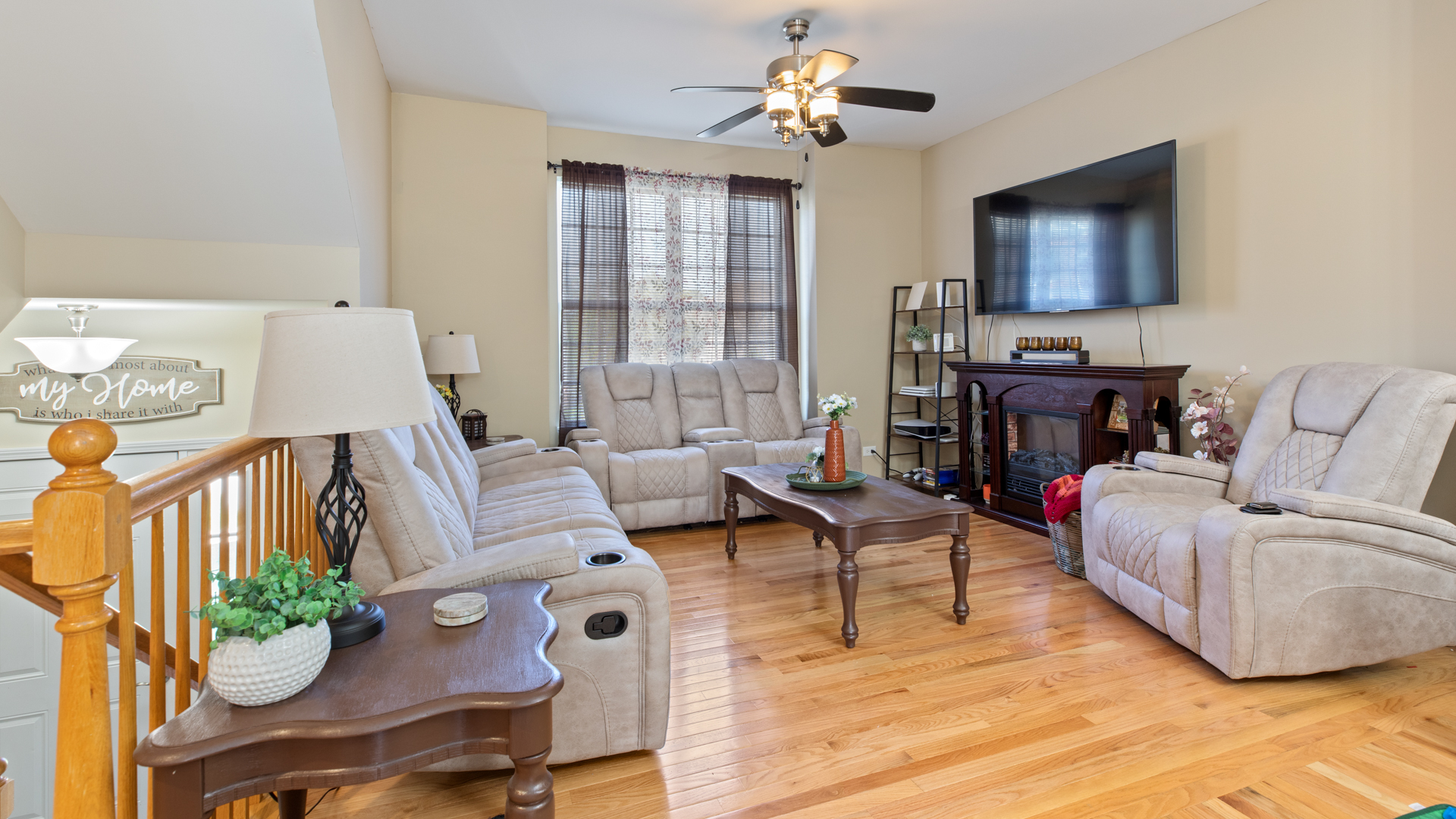 309 Timber Ridge Court Joliet, IL 60431 - Photo 5 of 18 a living room with furniture and a flat screen tv