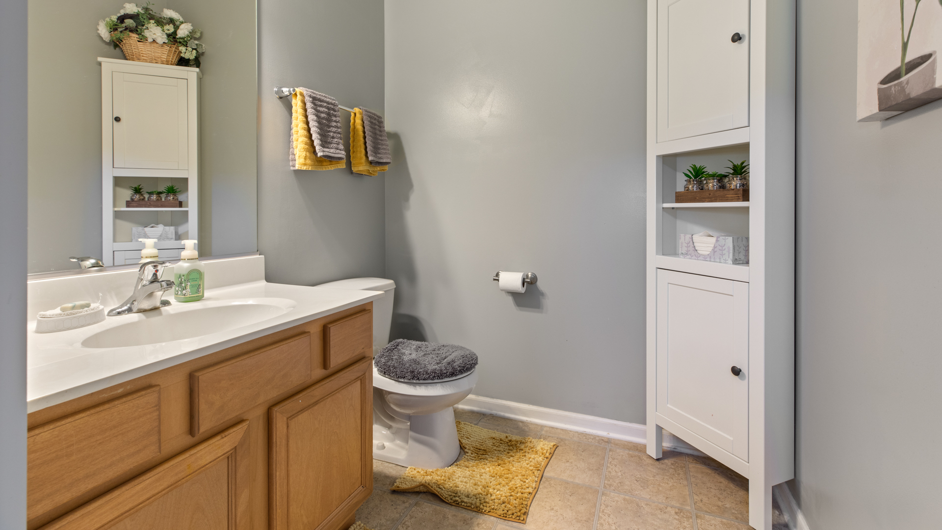 309 Timber Ridge Court Joliet, IL 60431 - Photo 10 of 18 a bathroom with a sink toilet and shower