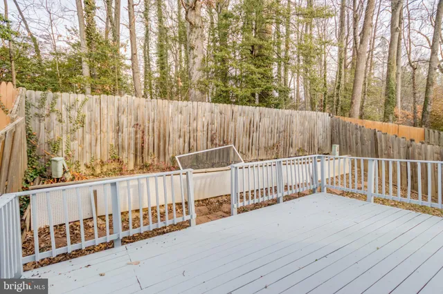 a view of a wooden fence