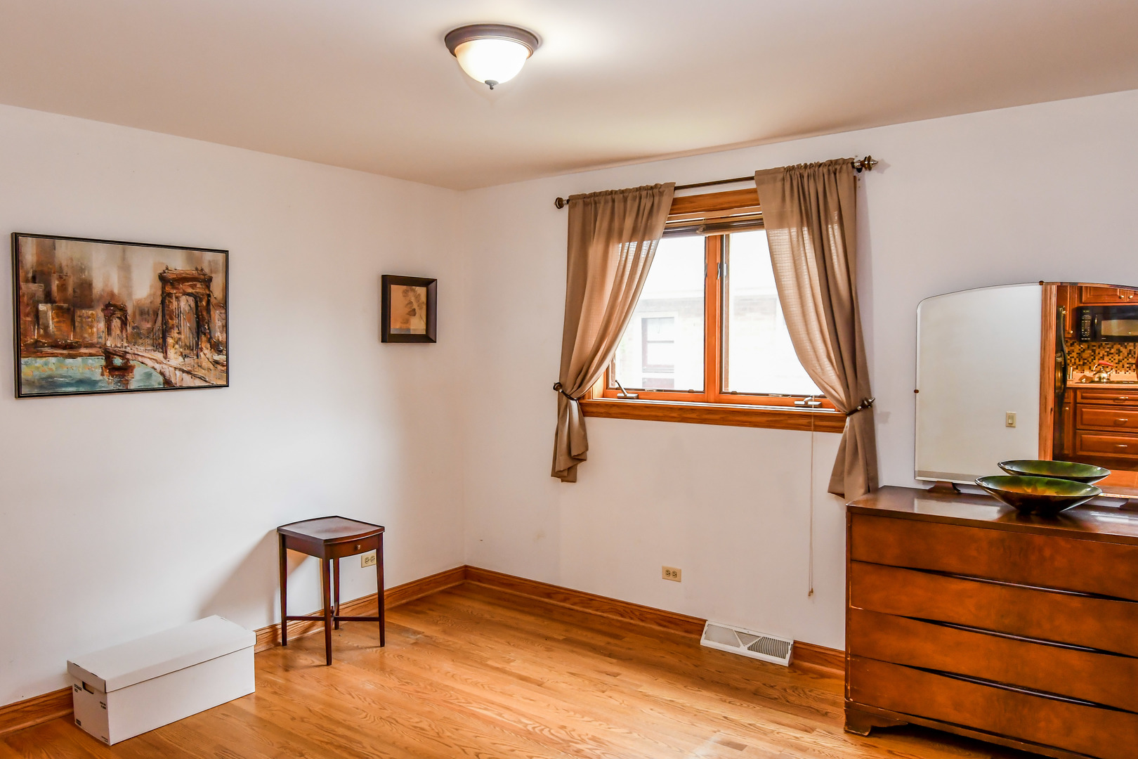 731 Spring Road Elmhurst, IL 60126 - Photo 15 of 23 a view of room with window and wooden floor