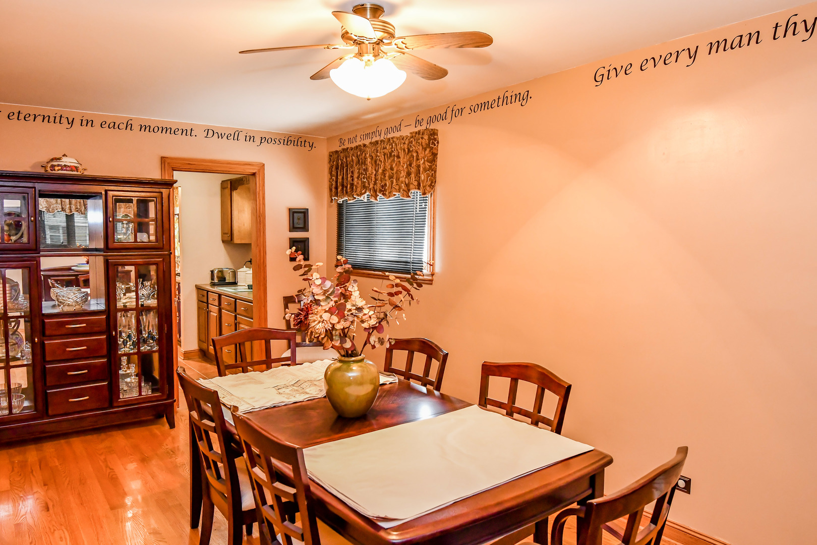 731 Spring Road Elmhurst, IL 60126 - Photo 4 of 23 a view of a dining room with furniture and a chandelier