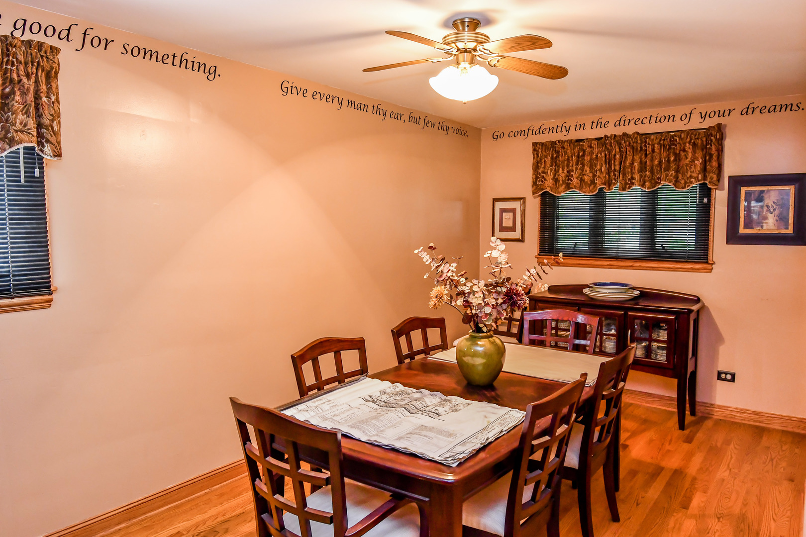 731 Spring Road Elmhurst, IL 60126 - Photo 5 of 23 a view of a dining room with furniture and chandelier