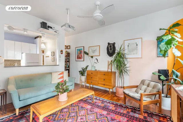 a picture of a park with an bench