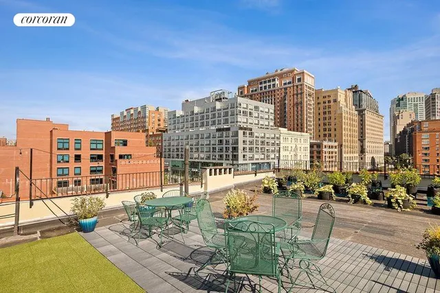 a kitchen with a white stove top oven and refrigerator