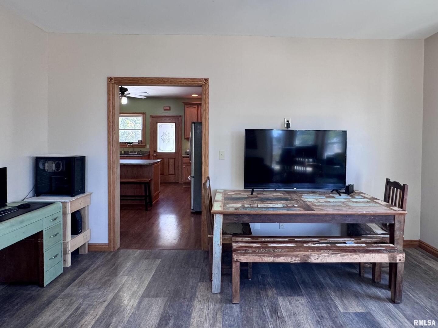 1415 4th Street Fulton, IL 61252 - Photo 42 of 58 a living room with furniture and a flat screen tv