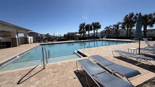 a view of a terrace with sitting area