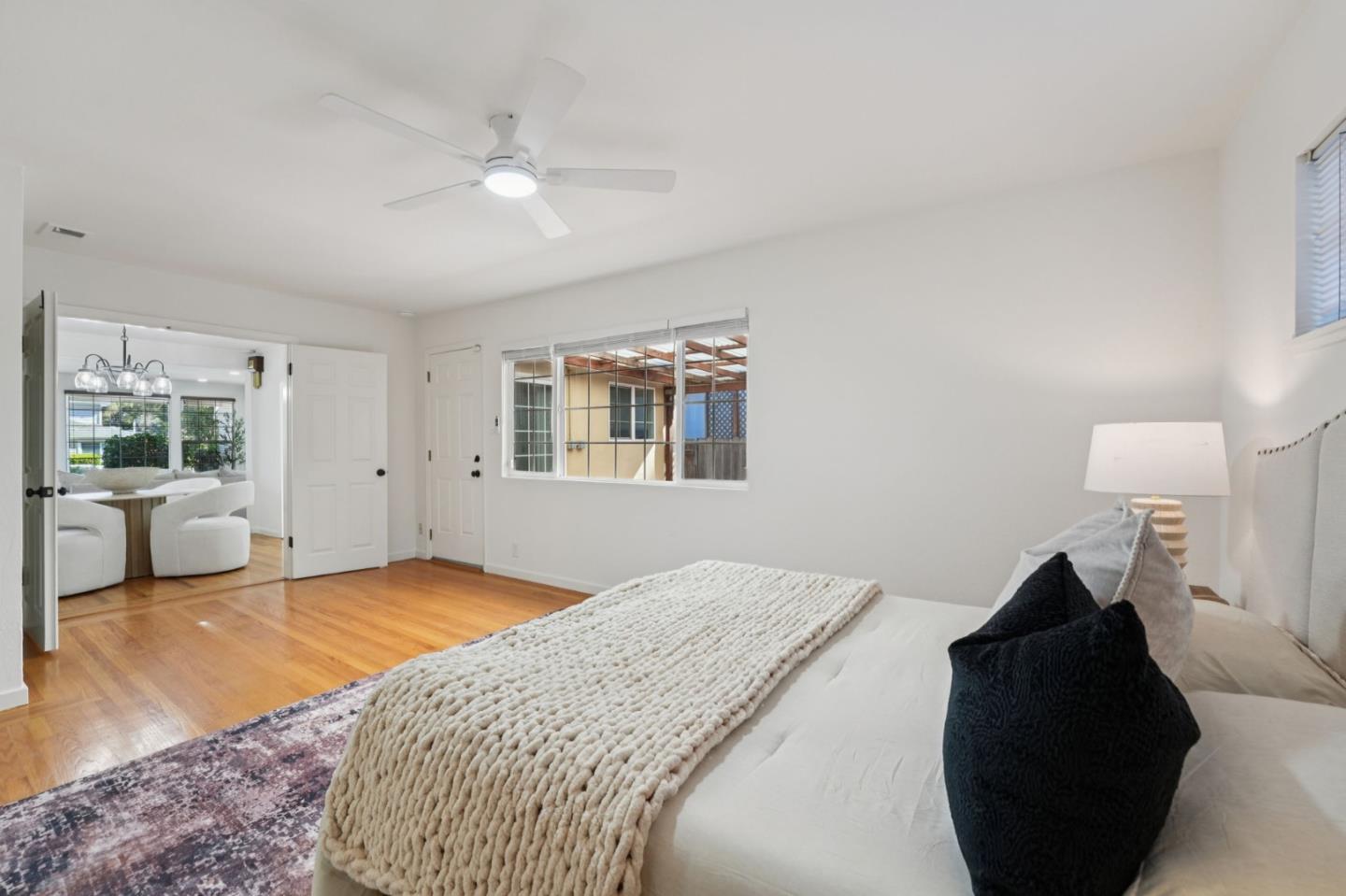 3336 Spring Street Redwood City, CA 94063 - Photo 29 of 40 a bedroom with a bed and window