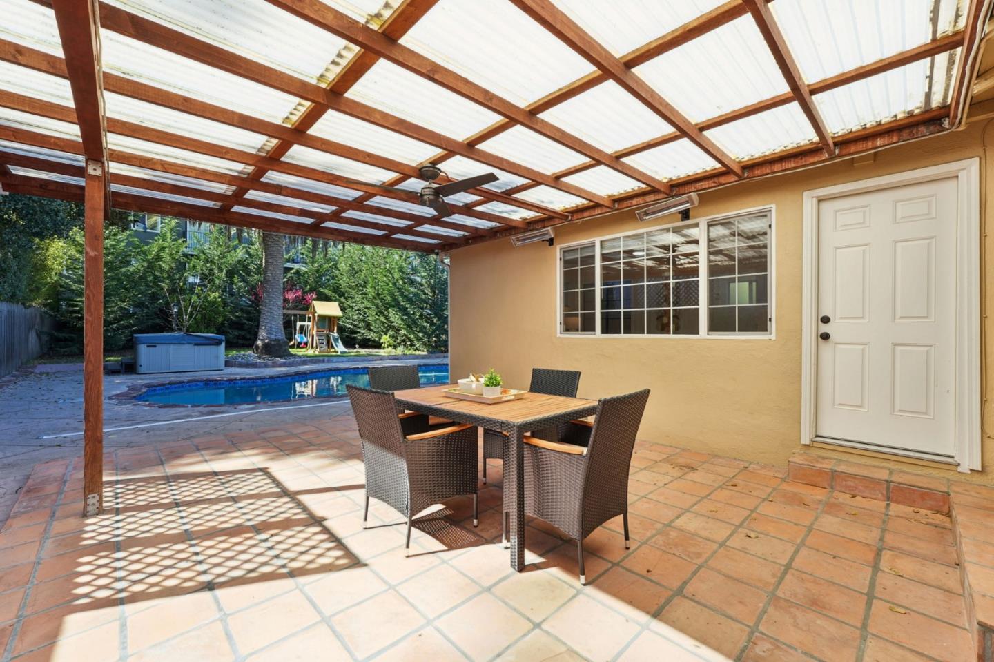 3336 Spring Street Redwood City, CA 94063 - Photo 37 of 40 a view of a porch with furniture
