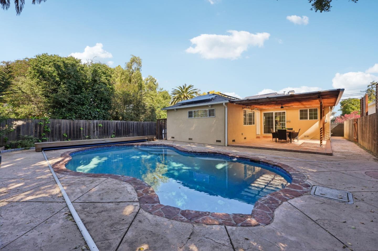 3336 Spring Street Redwood City, CA 94063 - Photo 39 of 40 swimming pool view with a seating space