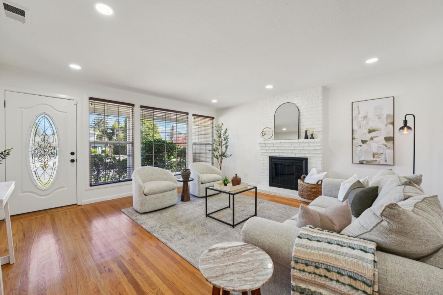 3336 Spring Street Redwood City, CA 94063 - Photo 10 of 40 a living room with furniture fireplace and window
