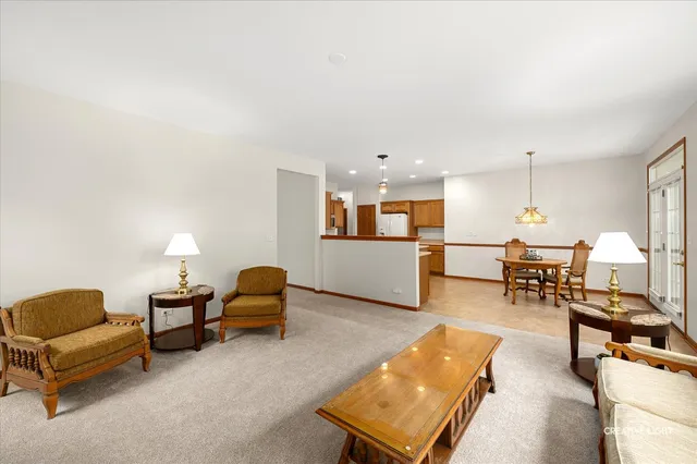 a living room with furniture and a table