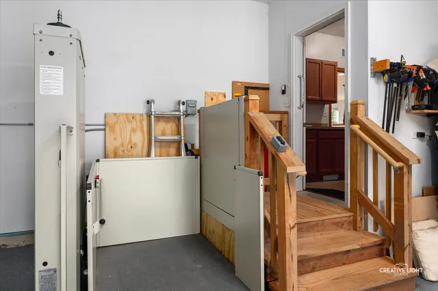 a view of a deck with furniture and garden