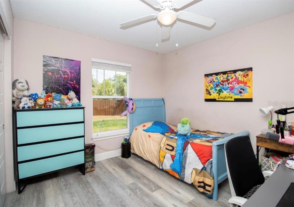 14 Hemlock Loop Court Ocala, FL 34472 - Photo 16 of 27 a bedroom with bed and a window