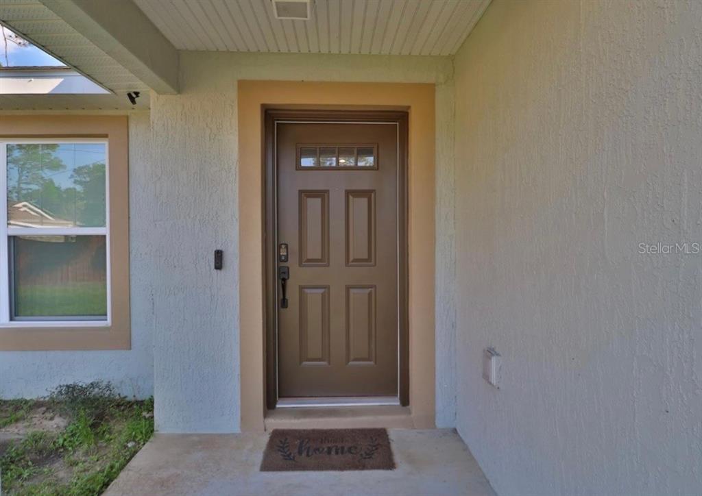 14 Hemlock Loop Court Ocala, FL 34472 - Photo 4 of 27 a view of front door
