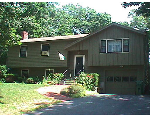 155 Swift Road Northbridge, MA 01588 - Photo 1 of 6 a front view of a house with a yard
