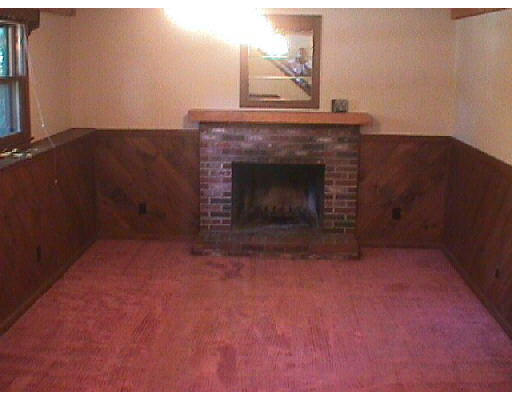 155 Swift Road Northbridge, MA 01588 - Photo 6 of 6 a view of empty room with a fireplace