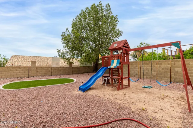 a view of a house with a swimming pool