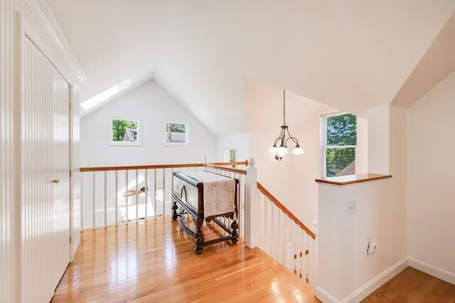 a view of entryway with wooden floor