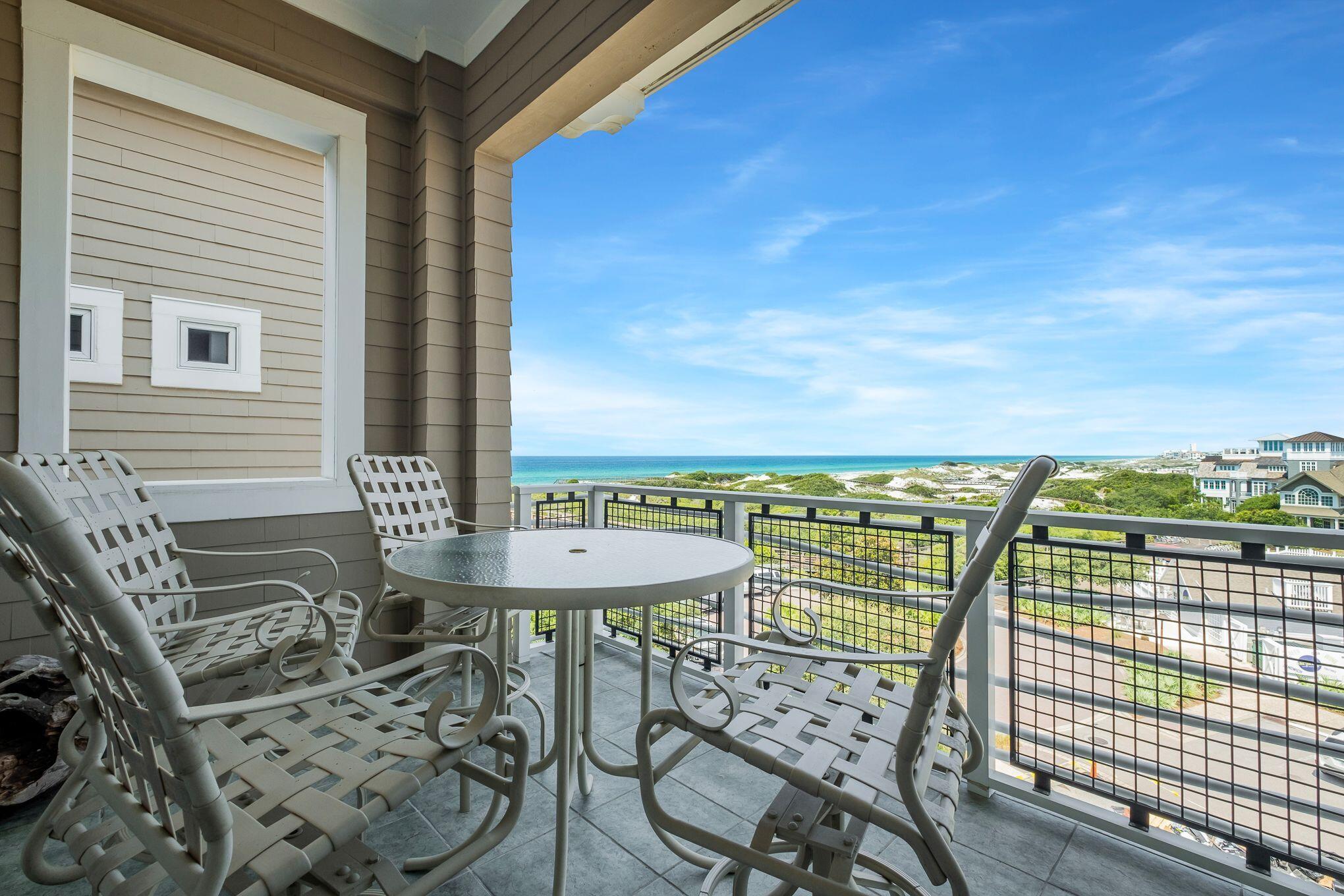 99 Compass Point Way South, Unit 406 Watersound, FL 32461 - Photo 32 of 41 a view of a balcony with chairs