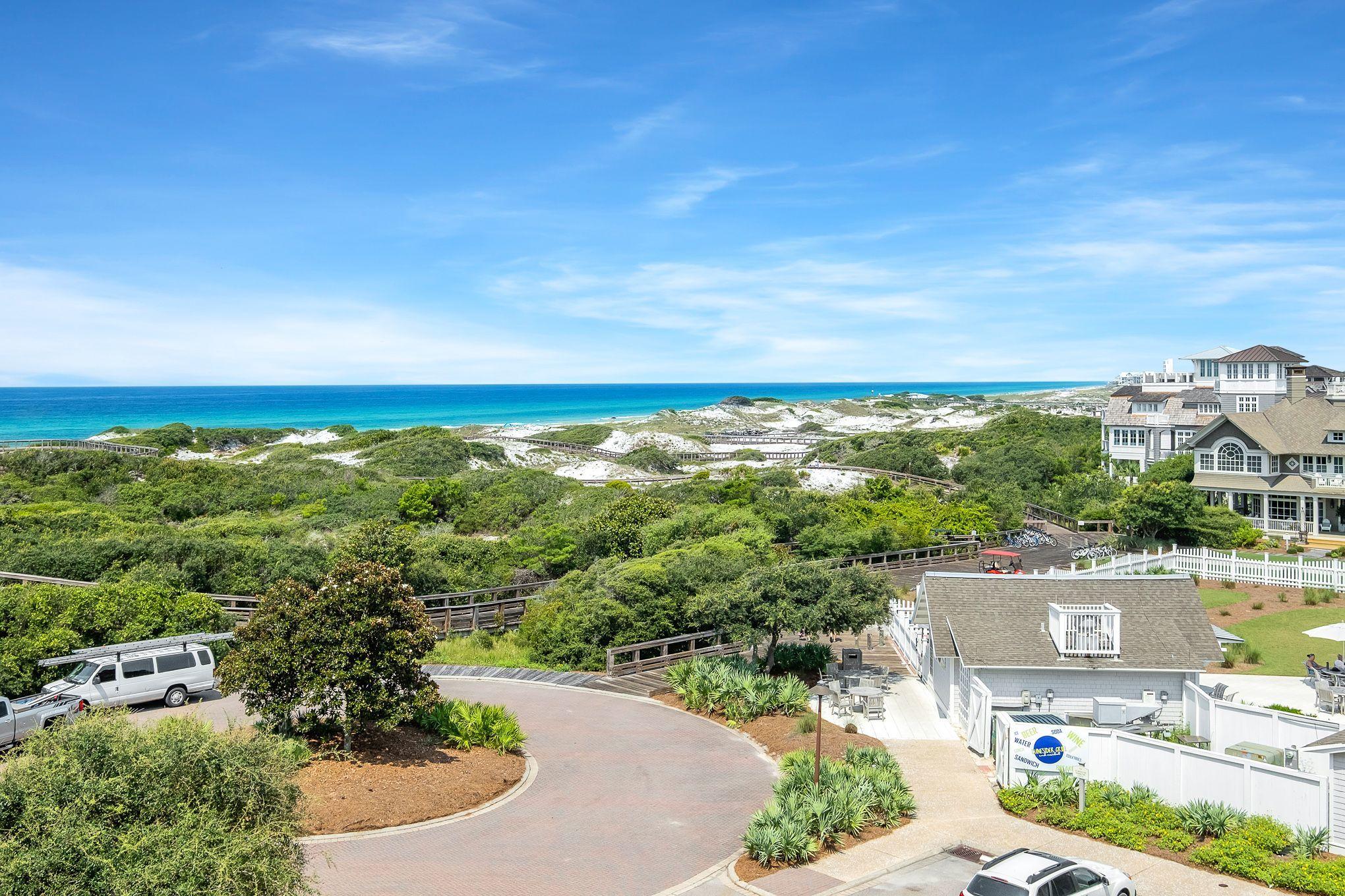 99 Compass Point Way South, Unit 406 Watersound, FL 32461 - Photo 7 of 41 a view of a city with tall buildings