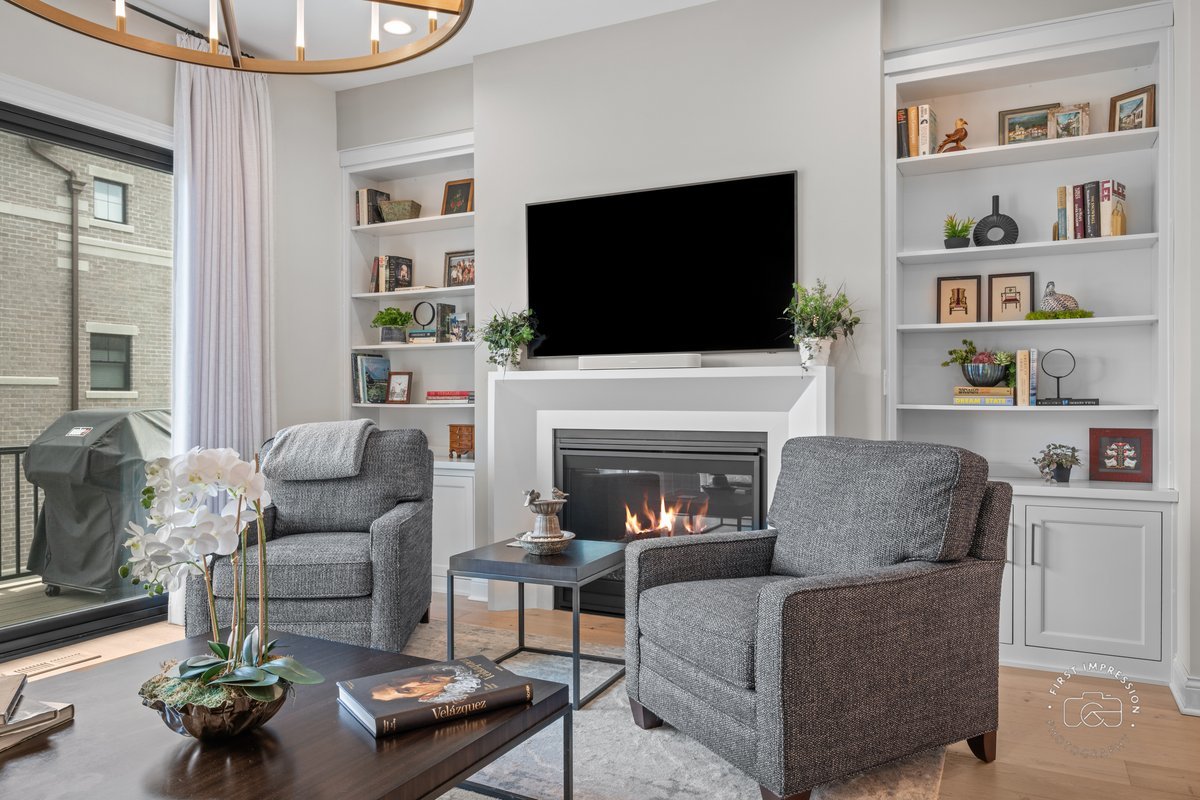 108 North Wright Street Naperville, IL 60540 - Photo 20 of 47 a living room with furniture a flat screen tv and a fireplace
