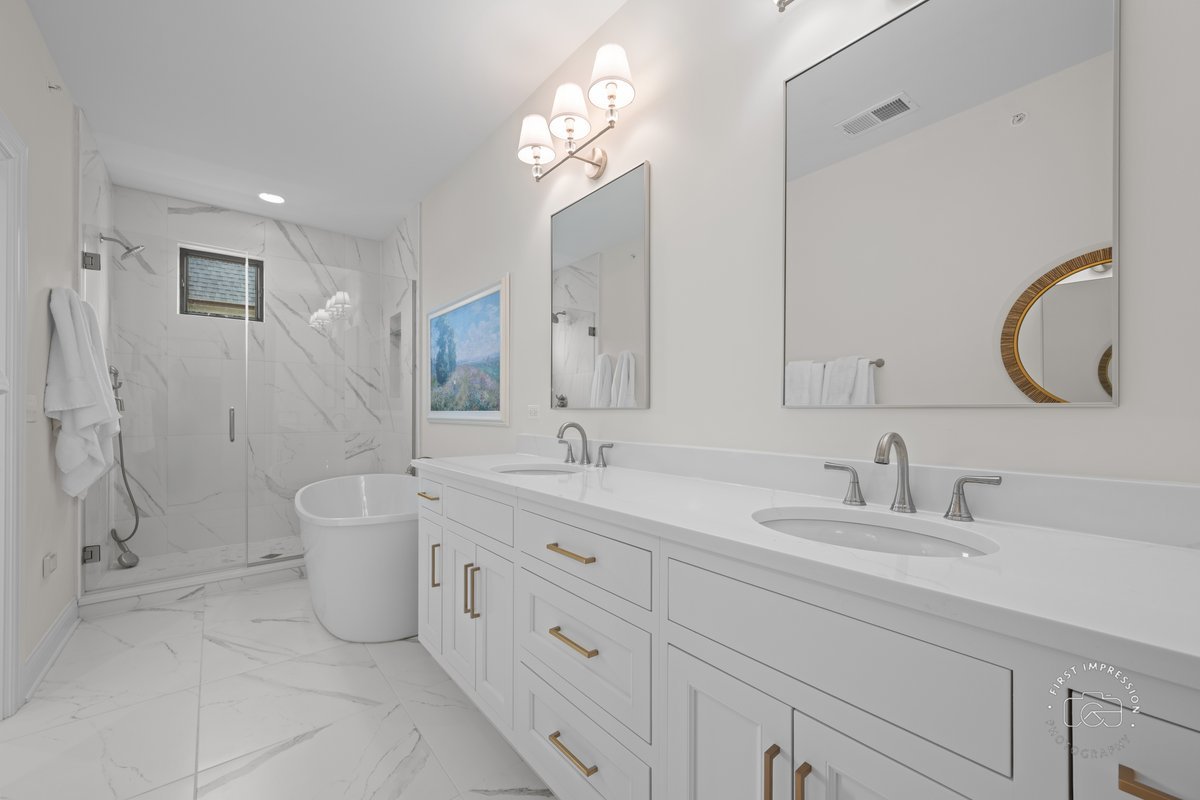 108 North Wright Street Naperville, IL 60540 - Photo 25 of 47 a bathroom with a double vanity sink mirror and bathtub