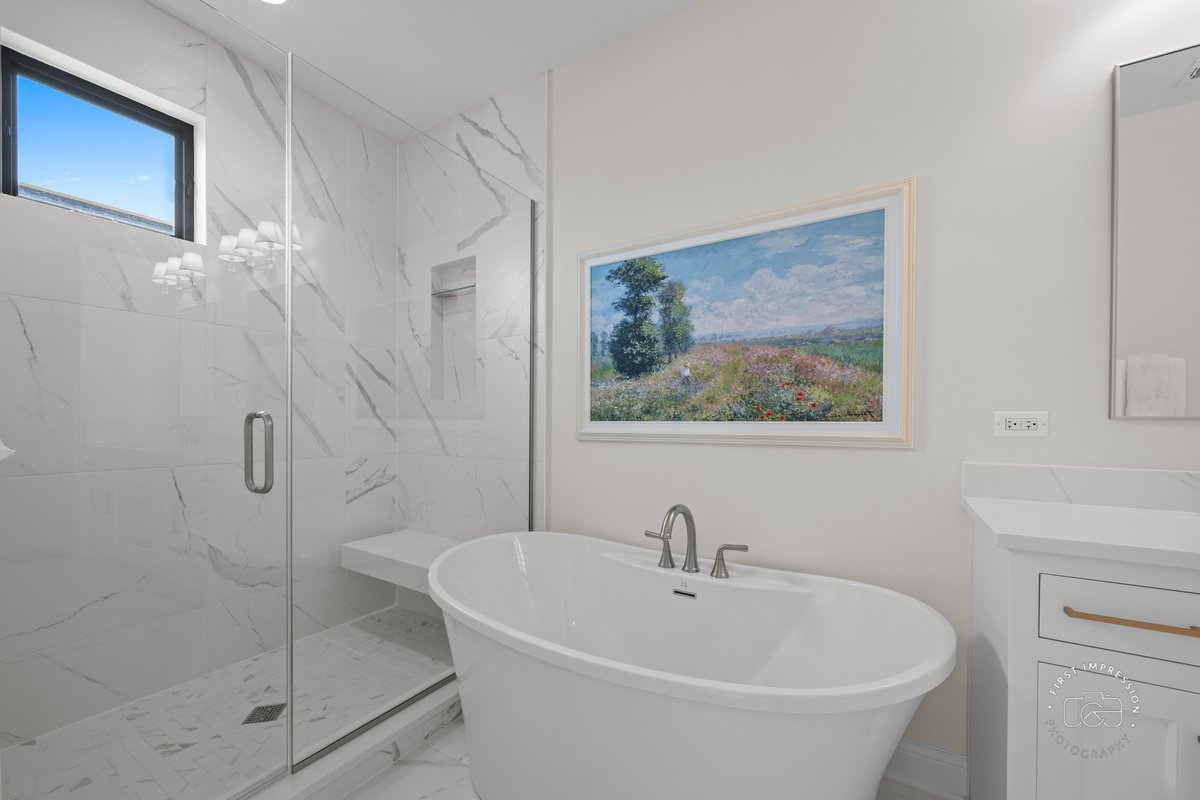 108 North Wright Street Naperville, IL 60540 - Photo 27 of 47 a white bath tub sitting next to a white sink