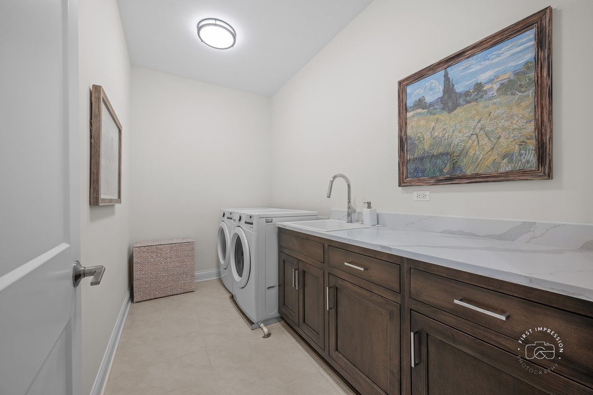 108 North Wright Street Naperville, IL 60540 - Photo 28 of 47 a utility room with a sink