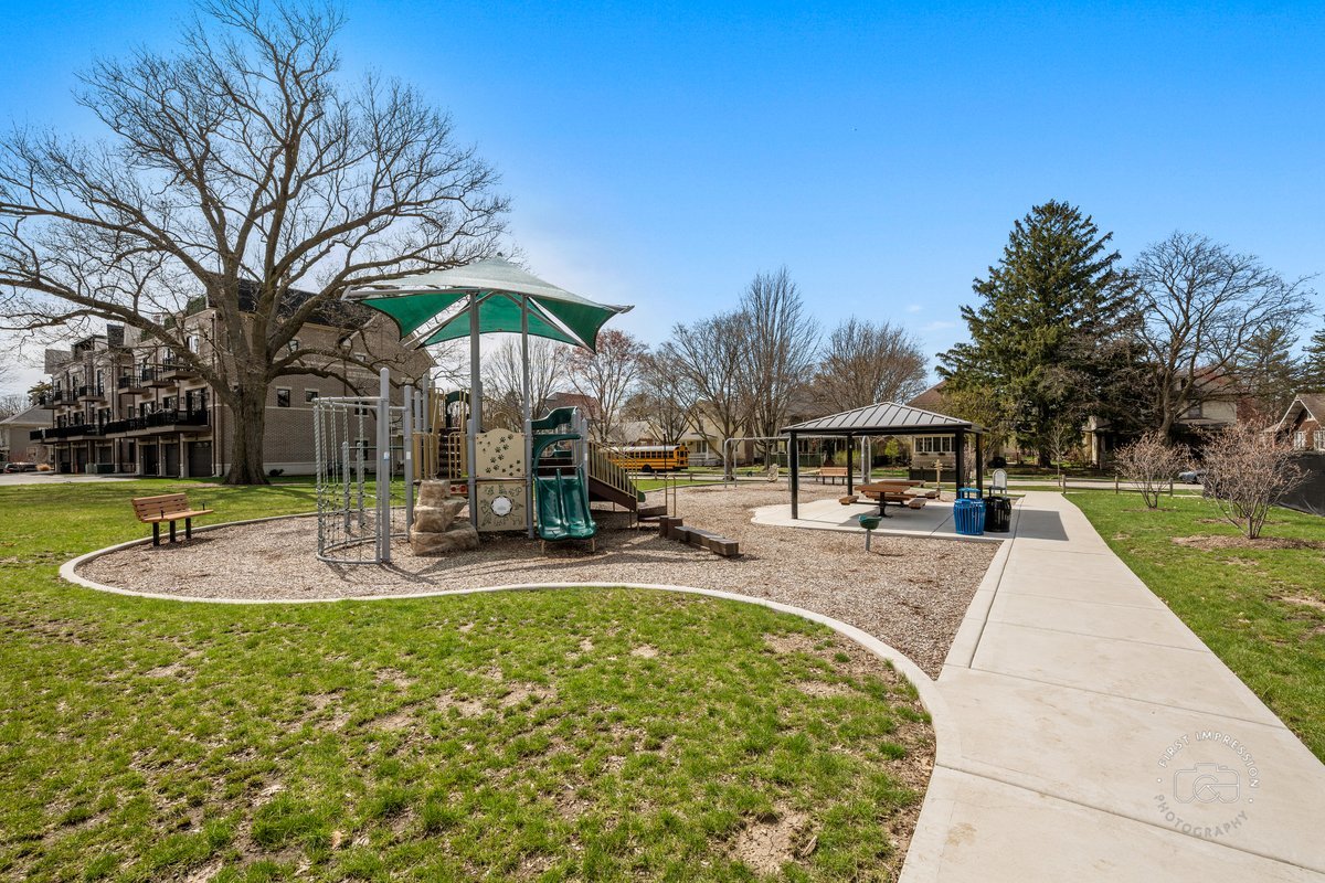 108 North Wright Street Naperville, IL 60540 - Photo 43 of 47 a view of a swimming pool with a patio