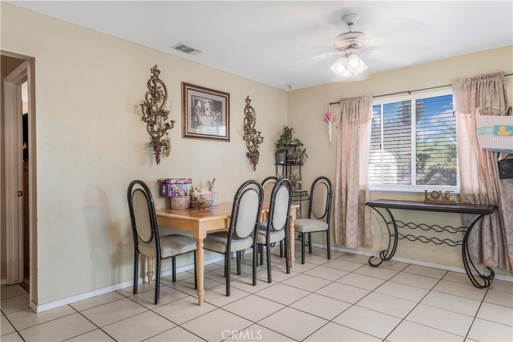 240 North 4th Street Shandon, CA 93461 - Photo 13 of 38 a view of a dining room with furniture window and outside view