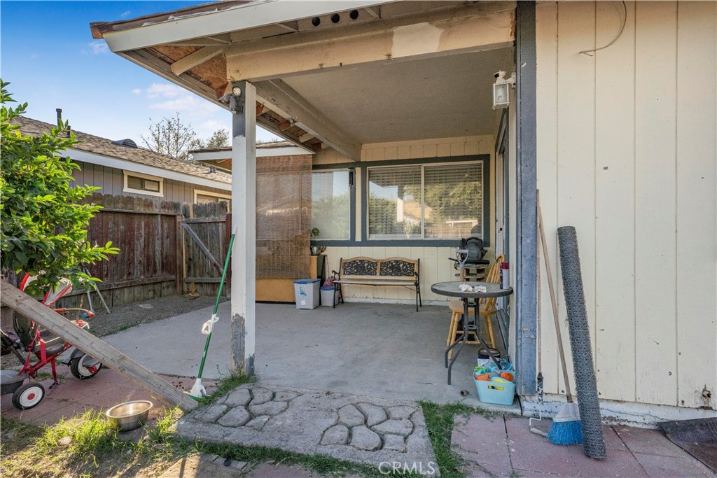 240 North 4th Street Shandon, CA 93461 - Photo 29 of 38 a view of a porch with furniture and a yard