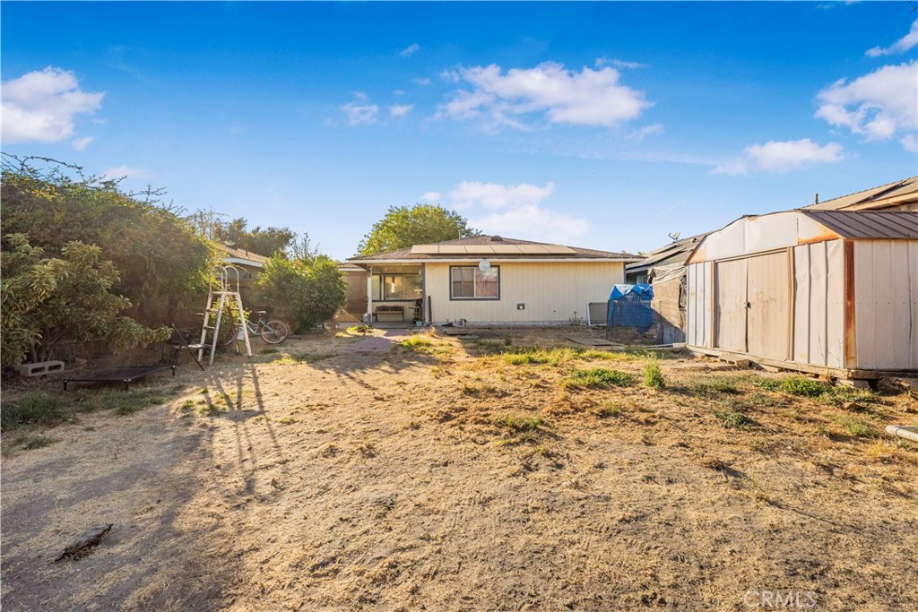 240 North 4th Street Shandon, CA 93461 - Photo 31 of 38 a view of a house with a yard
