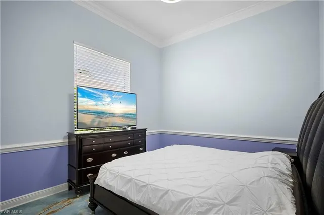 a view of a backyard with plants and a patio