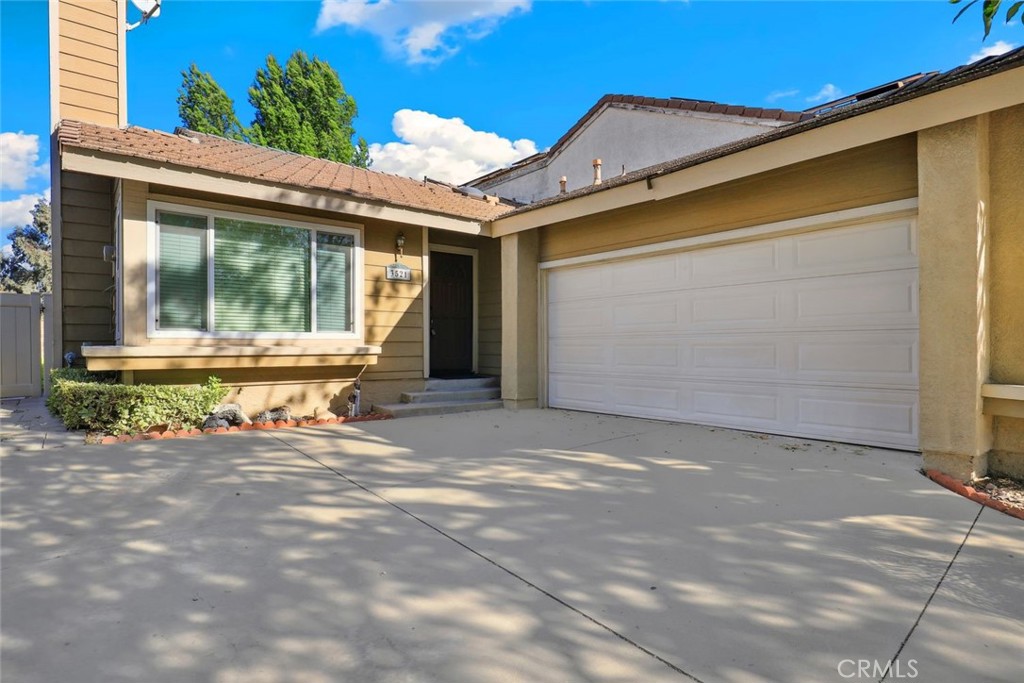 3521 Doe Spring Road Corona, CA 92882 - Photo 1 of 1 a view of a house with a outdoor space