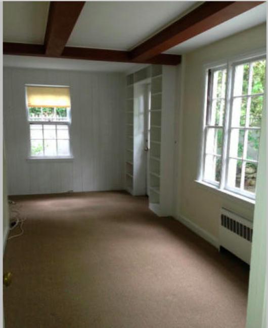 106 Woodland Road New Canaan, CT 06840 - Photo 8 of 10 a view of an empty room with a window