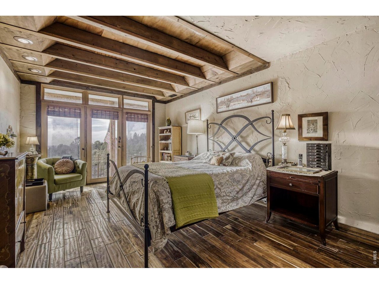1042 Steamboat Valley Road Lyons, CO 80540 - Photo 10 of 46 Master West Wing - Trace beamed Ceilings, French Doors leading to outdoor patio deck. Incredible view from here!