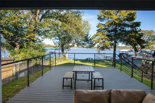 swimming pool view with a seating space