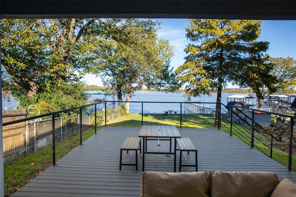 swimming pool view with a seating space