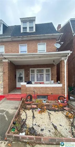 front view of house with a lounge chair