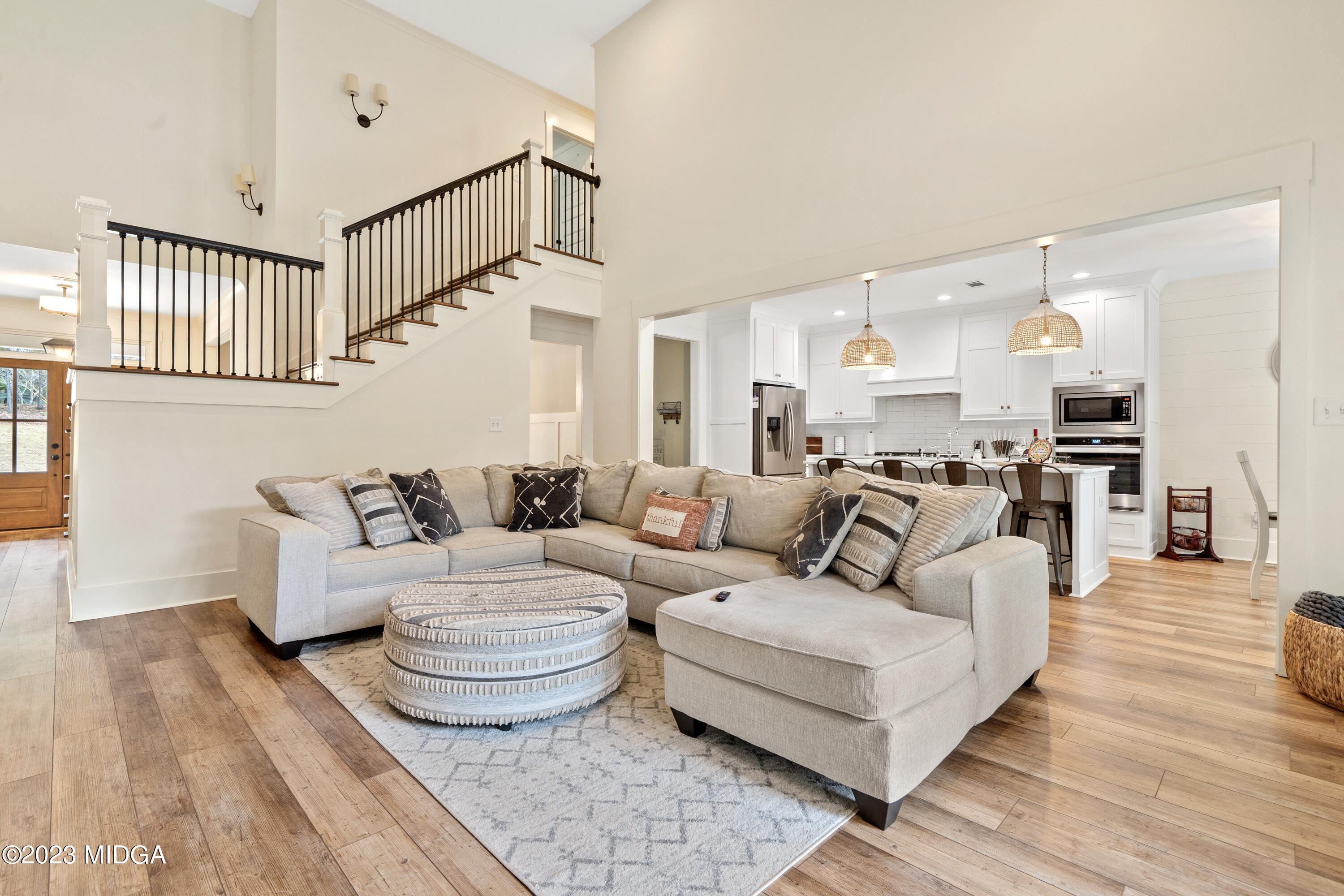556 Pea Ridge Road Juliette, GA 31046 - Photo 12 of 42 a living room with furniture and a view of kitchen