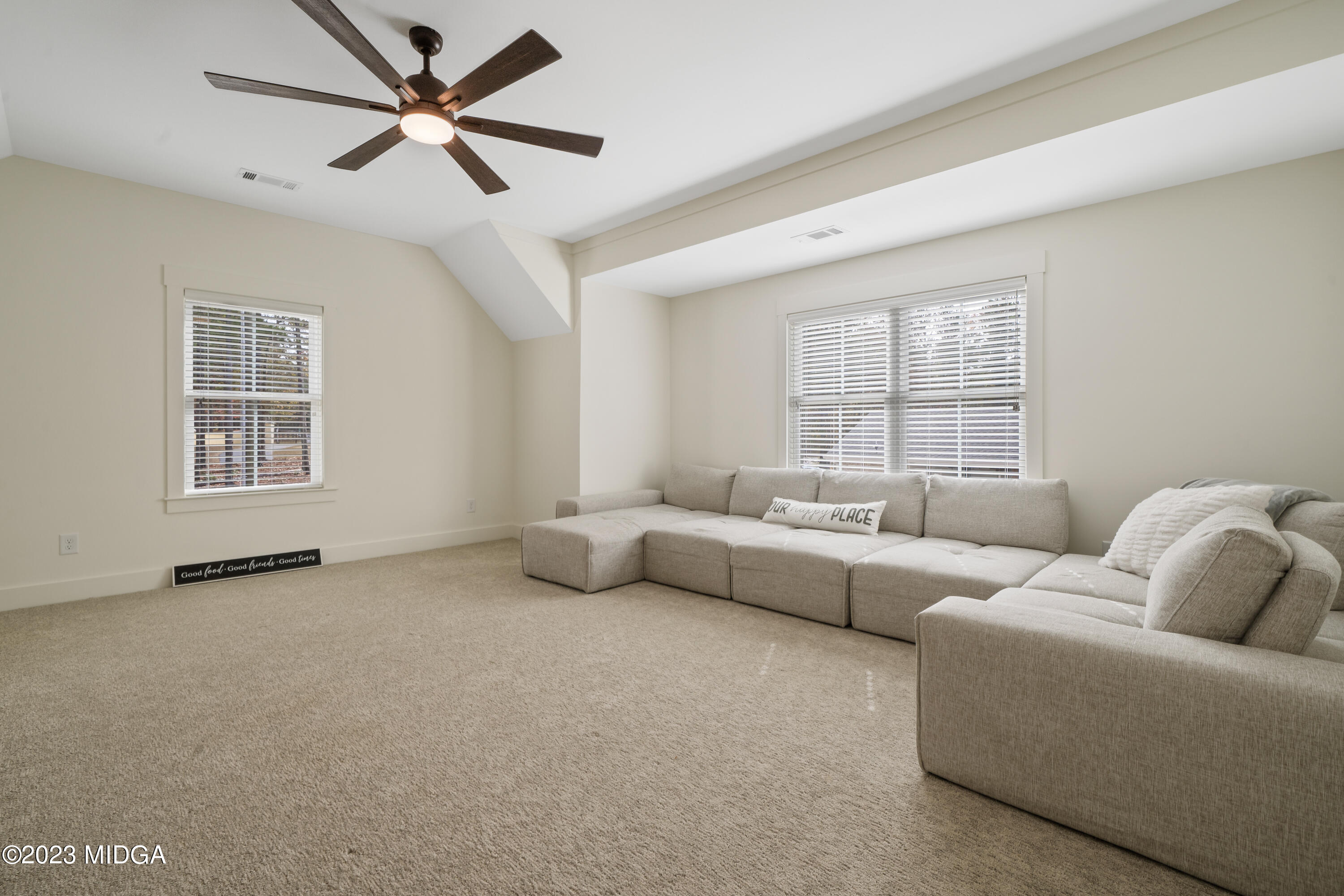 556 Pea Ridge Road Juliette, GA 31046 - Photo 29 of 42 a living room with furniture and windows